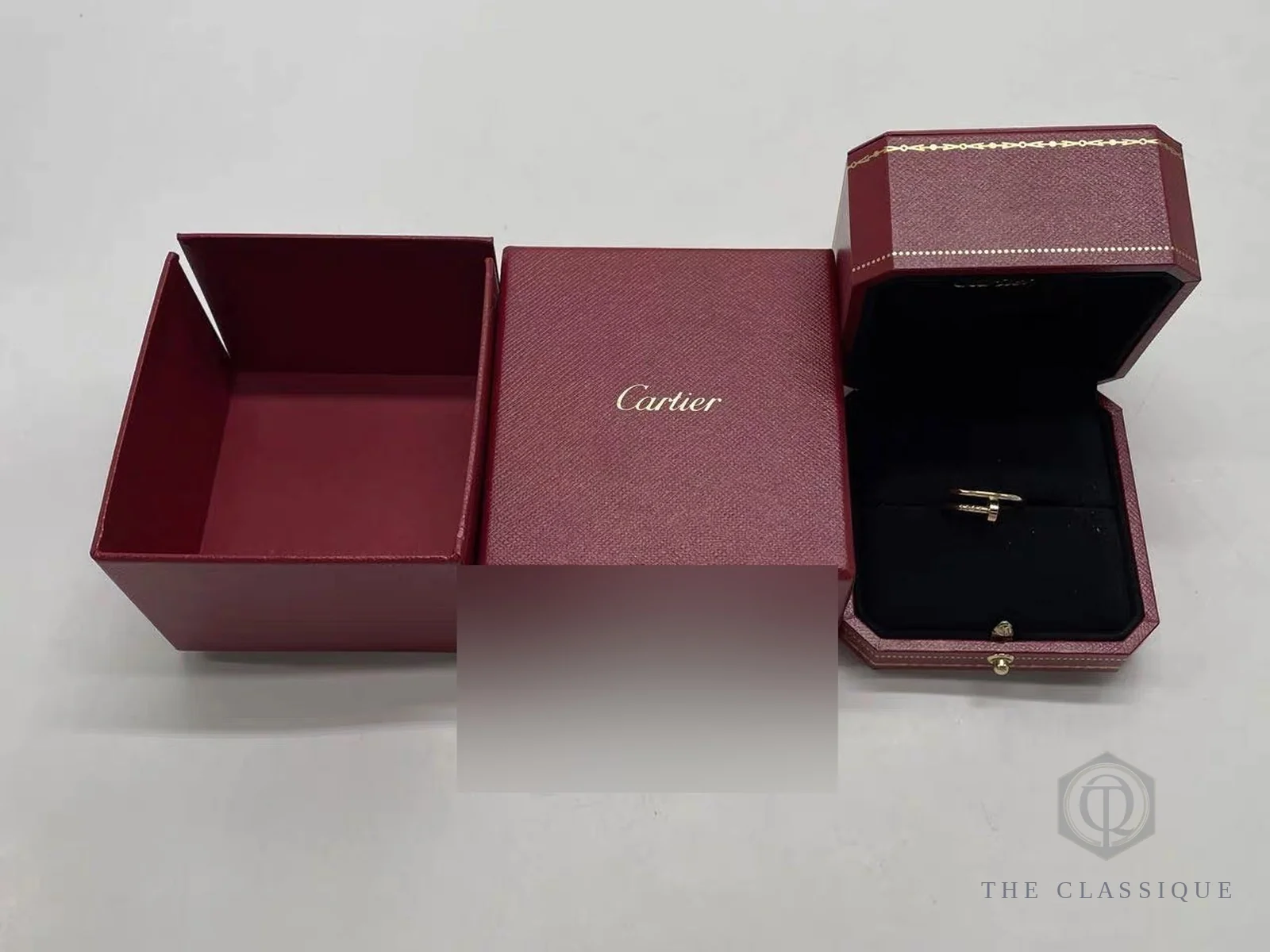Hộp đỏ Cartier đựng nhẫn đinh, kèm sổ chứng nhận